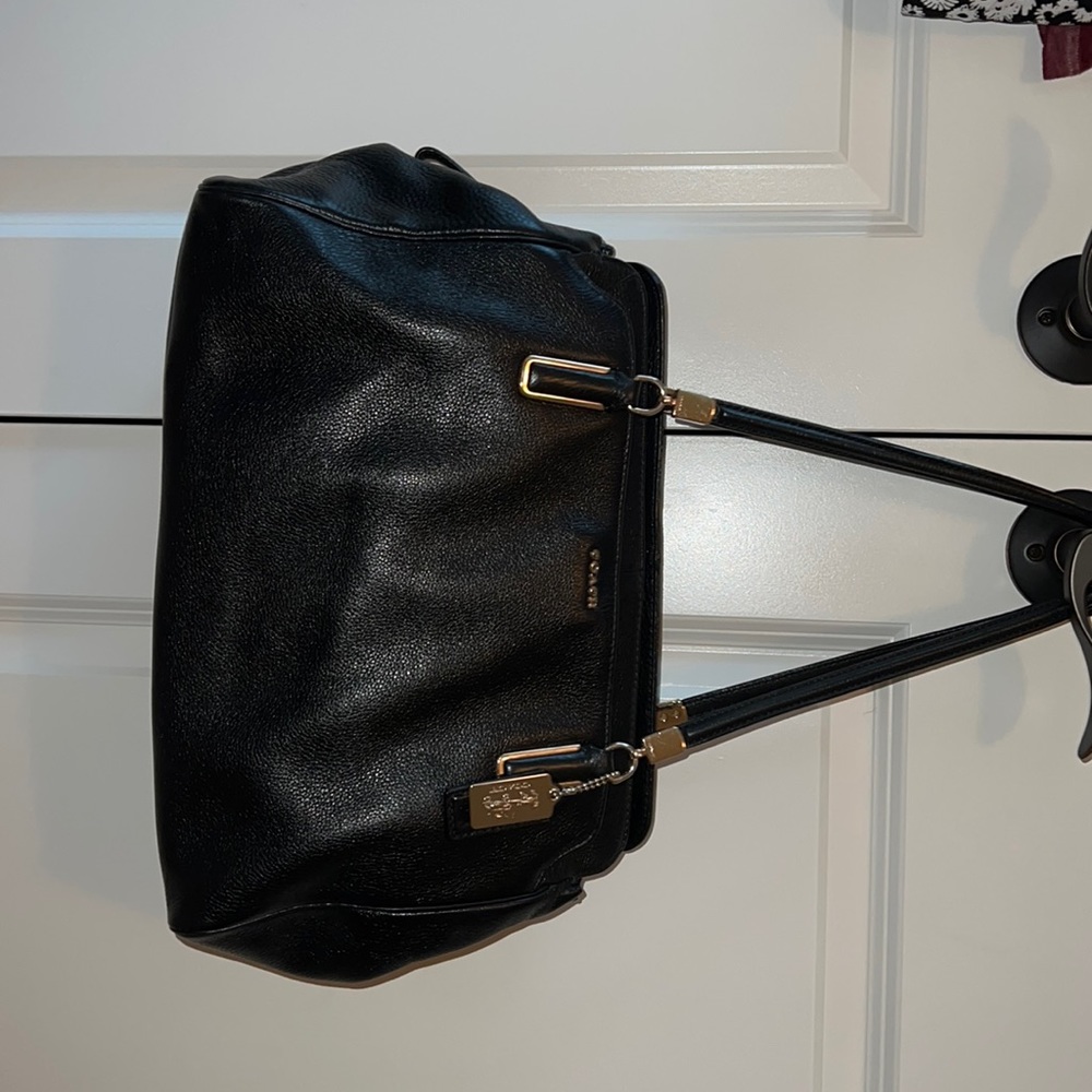 Black leather Coach handbag.